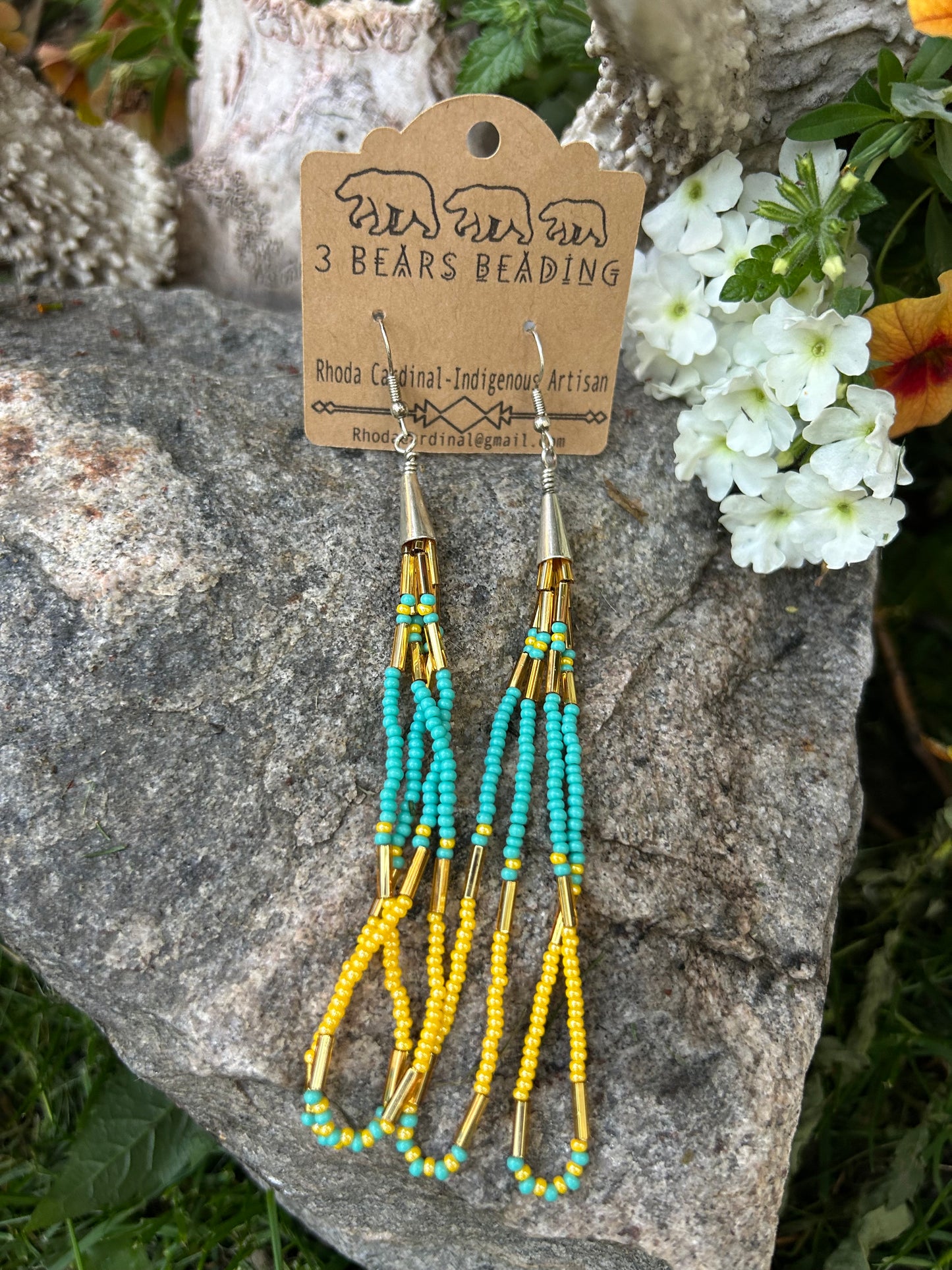 Yellow and teal dangle earrings with silver accents